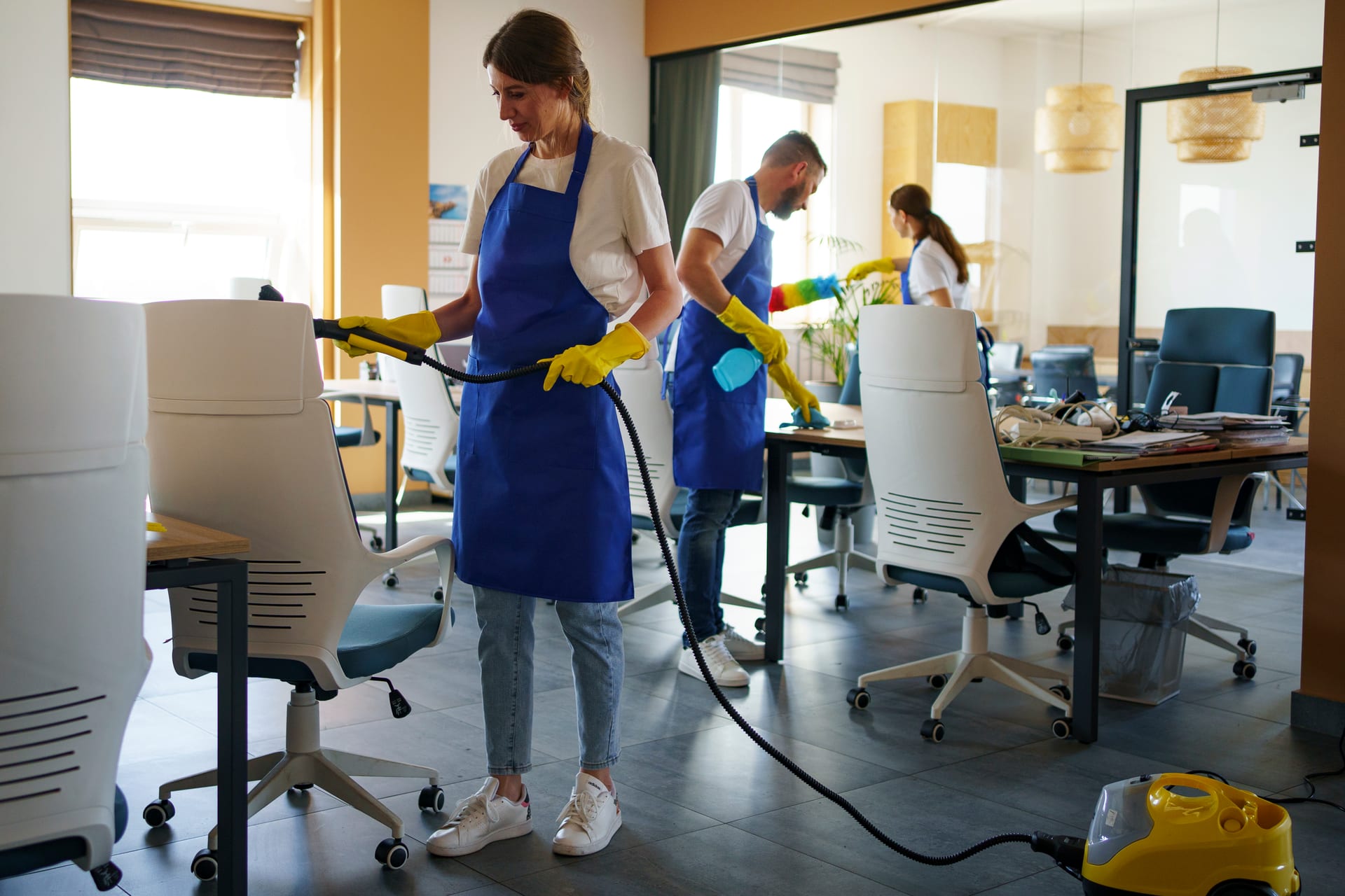 Professional cleaning team working in an office